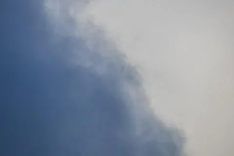 Cloudy landscape in the spring sky Stock Photos