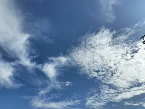 Cloudy light blue sky texture. natural background Stock Photos