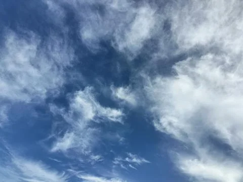 Cloudy light blue sky texture. natural background Stock Photos