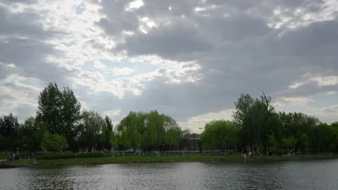 Cloudy light through dark clouds Stock Footage 195457105