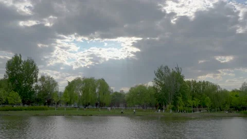 Cloudy light through dark clouds Stock Footage 195457411