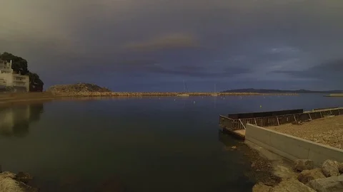 Cloudy mediterranean dawn at the beach Stock Footage 118700743