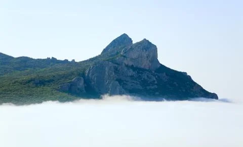 Cloudy mountain landscape Stock Photos