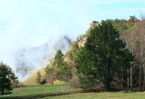 Cloudy mountain landscape Stock Photos