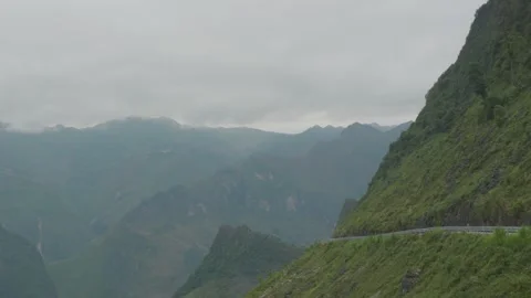 Cloudy Mountain Road Along Ha Giang Cliffs Stock Footage 336717553