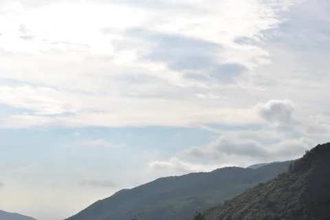 Cloudy mountain top Stock Photos