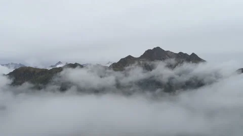 Cloudy mountain top time laps Stock Footage 214017568