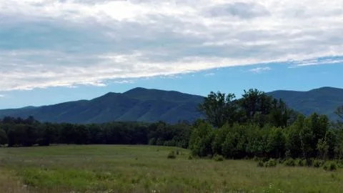 Cloudy Mountain Vista Stock Photos