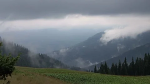 Cloudy mountainces Stock Footage 158232462