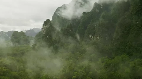 Cloudy Mountains Mysterious Drone Shot Thailand, Khao Sok - Drone 4k Stock Footage 150160101