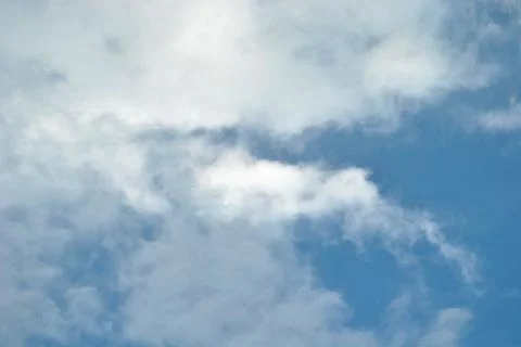 Cloudy nice sky at midday with sun bright Stock Photos