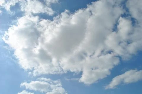 Cloudy nice sky at midday with sun bright Stock Photos