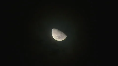Cloudy night sky. Moon hiding as the clouds are appearing in the dark sky. Stock Footage 178322494