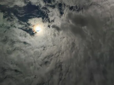 Cloudy night sky with moon Stock Photos