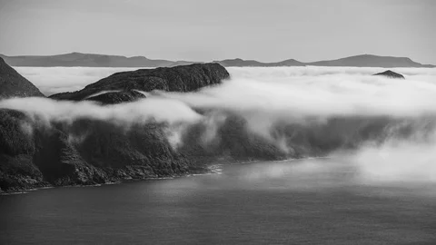 Cloudy norwegian coastline with inversion Stock Footage 122952590