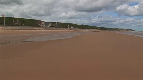 Cloudy Omaha beach with Vierville-sur-Mer in background Normandy,France Stock Footage 104222676