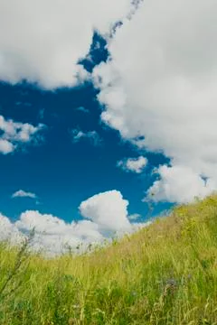 Cloudy over hill Stock Photos