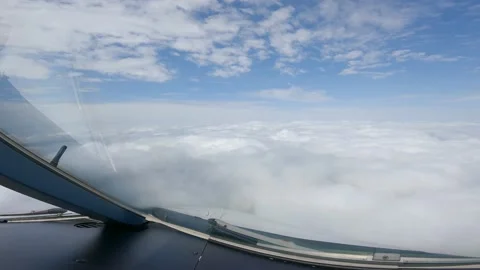 Cloudy plane flying view from cockpit Stock Footage 230173855