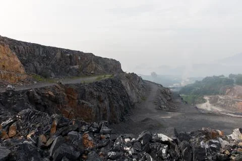 Cloudy quarry landscape Stock Photos