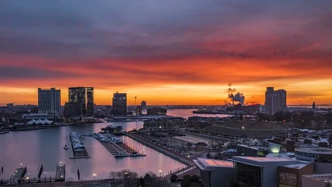 Cloudy, Red Sky Sunrise Over The Inner Harbor Timelapse Stock Footage 84002716