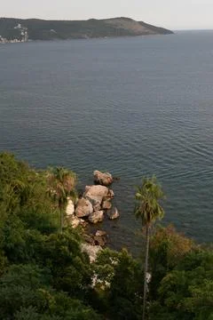 Cloudy seashore without sunlight Stock Photos