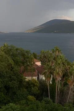 Cloudy seashore without sunlight Stock Photos