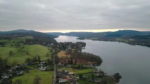 Cloudy skies hover over tranquil lake Stock Footage 345655371