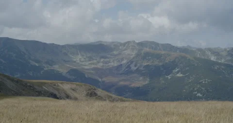 Cloudy sky above Parang mountain pastures 4K 60fps video Video stock 267777401