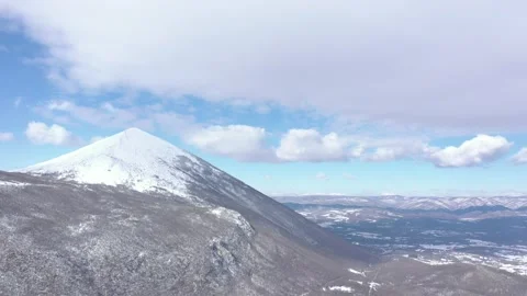 Cloudy sky above the Rtanj mountain by winter 4K drone video Stock Footage 105292454