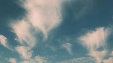 A Cloudy Sky adorned with Whimsical Patterns that inspire imagination and calm t Stock Photos