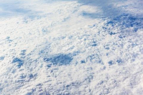 Cloudy sky from the airplane Stock Photos