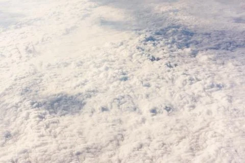 Cloudy sky from the airplane Stock Photos