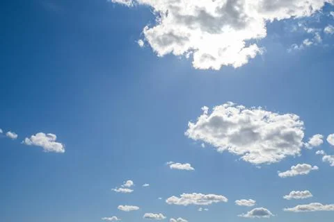 Cloudy sky. The airspace. Clouds in the blue sky. Environment Stock Photos