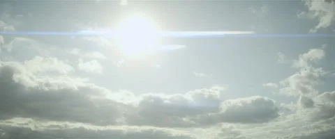 Cloudy sky anamorphic lens flare Stock-Footage 242861860