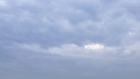 Cloudy sky and a bird flying Stock Footage 73888509