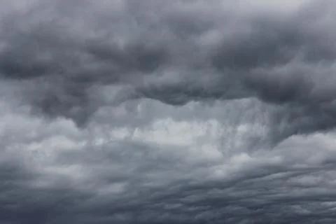 Cloudy sky and black clouds before the rain. Stock Photos