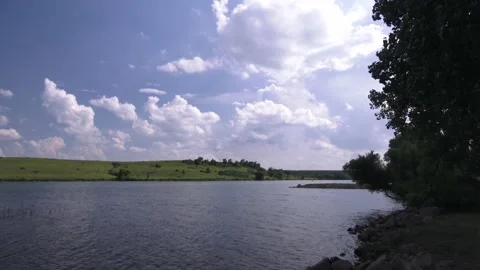 Cloudy sky and lake Stock Footage 138652395