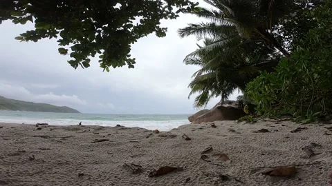 Cloudy sky and a rainy day on a beach in Praslin Island, Seychelles Stock Footage 196713353