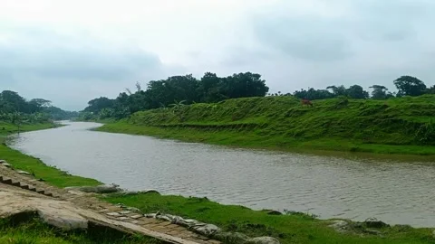 Cloudy Sky and River Water Waves in Natural Bangladesh River Landscape, pure nat 動画素材 316007331
