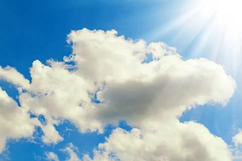 Cloudy sky and sun Stock Photos