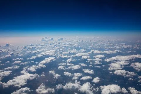 Cloudy sky background. View out of an airplane window. Foto stock