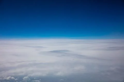 Cloudy sky background. View out of an airplane window. Foto stock