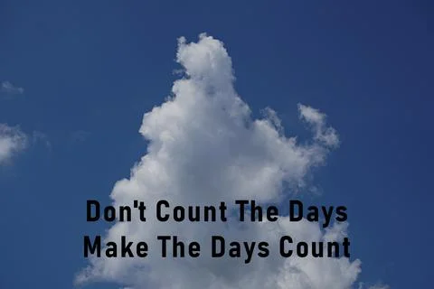 Cloudy sky background with the words don't count the day, make the day count Stock-Fotos