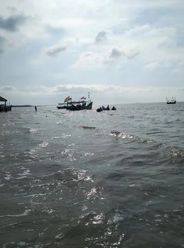 Cloudy sky on the beach Stock Photos