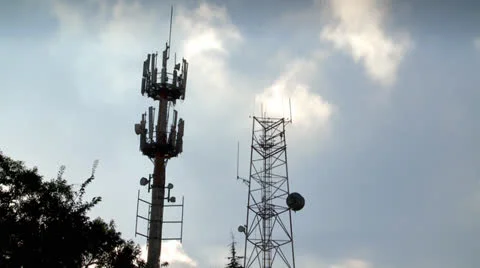 Cloudy Sky beyond Antenas - Timelapse 1 Stock Footage 22794580