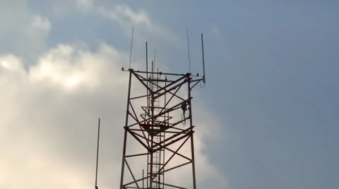 Cloudy Sky beyond Antenas - Timelapse 2 Stock Footage 22794991