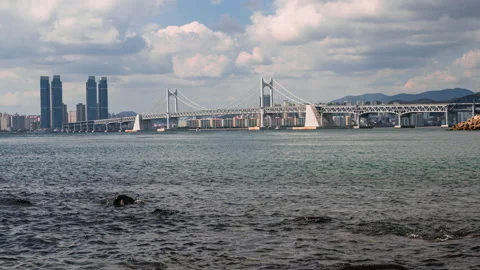 Cloudy sky at Busan Gwangalli Beach and Gwangan Bridge. Stock Footage 141015116