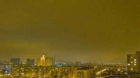 Cloudy sky at city night  Stock Footage 983406