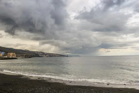Cloudy sky on the coast Foto stock