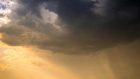 Cloudy Sky With Dark Storm Clouds During Rain. Natural Background With 写真素材